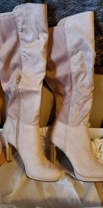 Brand new heeled boots